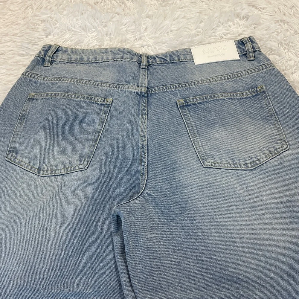 BOOHOO MAN WOMENS Distressed Light Blue Jeans WIDE LEG SIZE.  WAIST 34